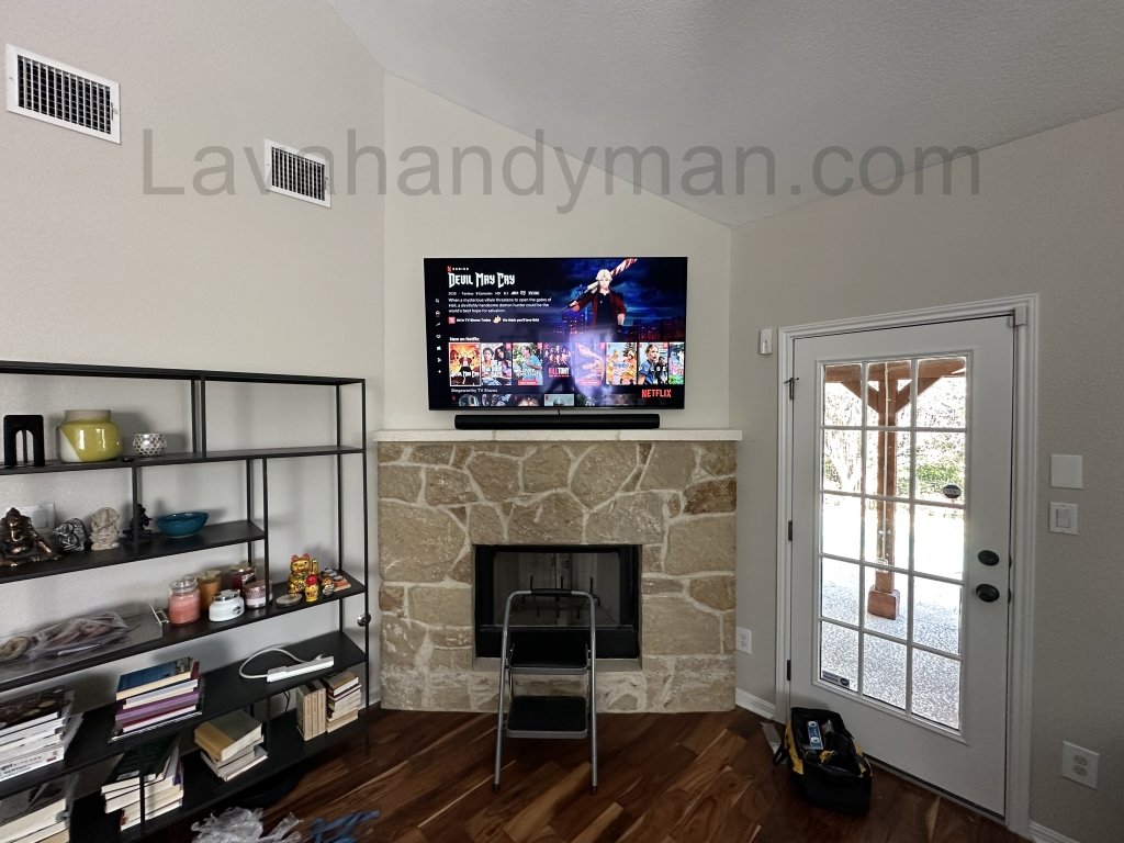 Lava handyman Tv mounting top of fireplace