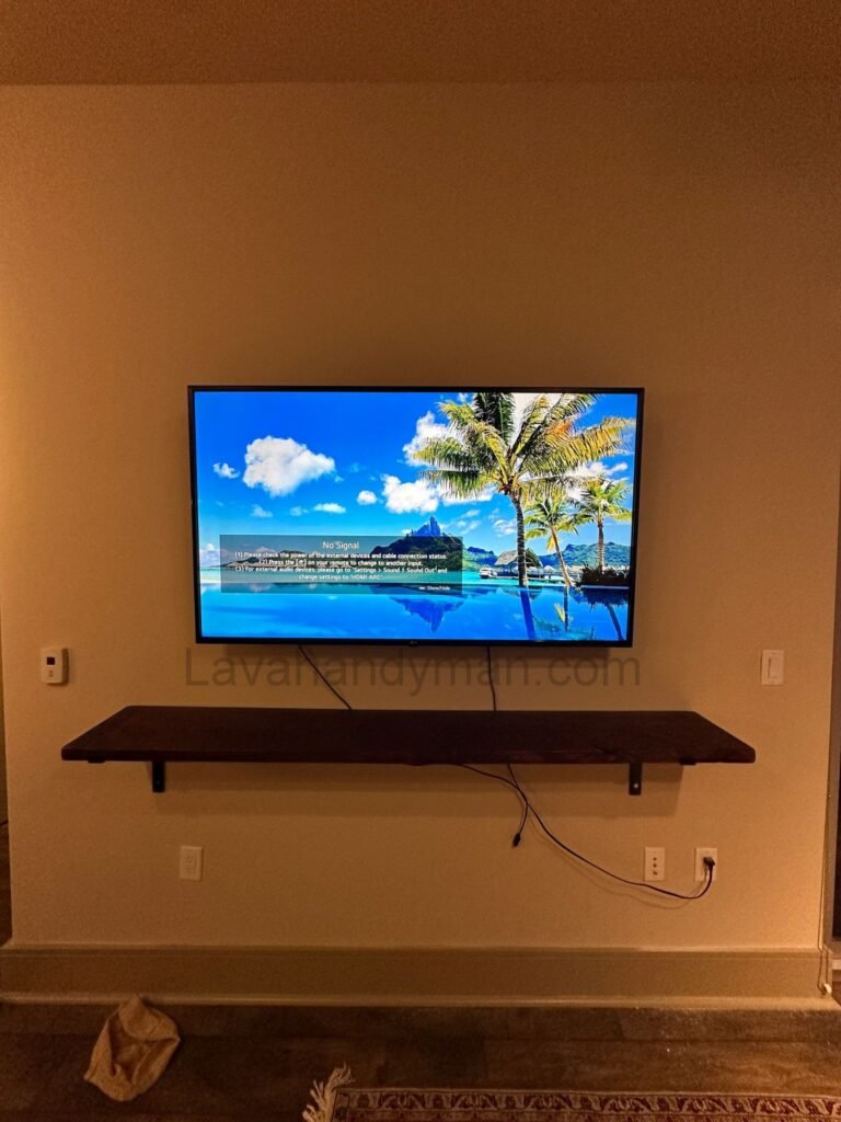 wall mounting a TV in a modern living room setup