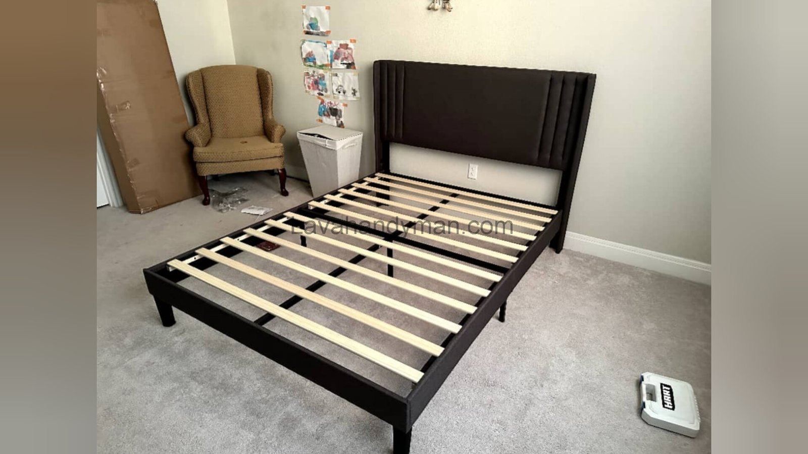 Bed Frame Assembly and Hanging Art on the Wall