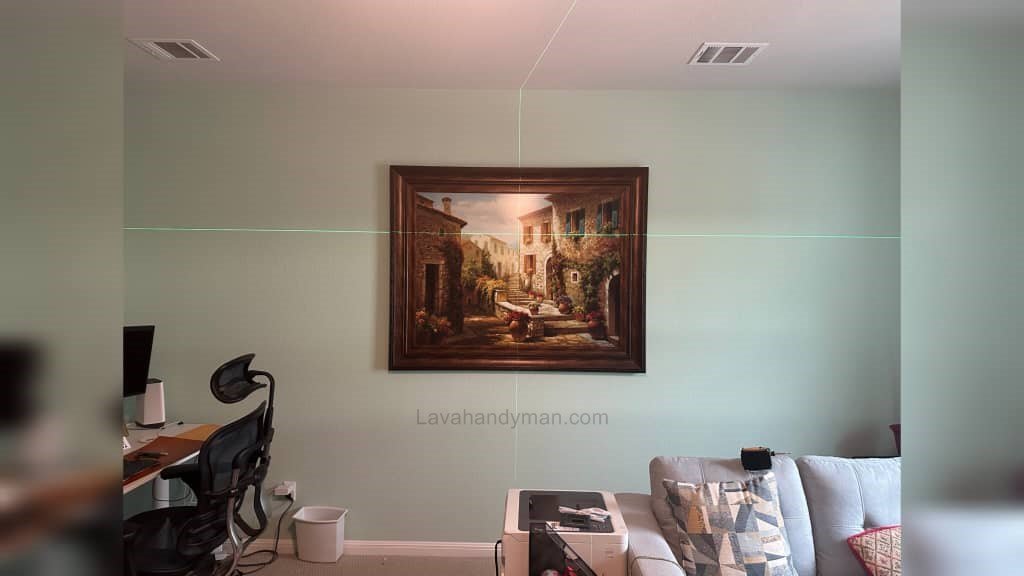 A Comprehensive Article on Laser Levels and Their Application in Installing Artwork on Walls
