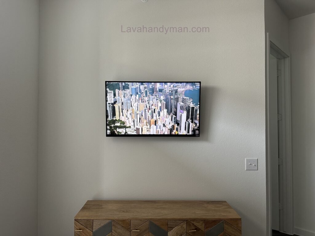 Wall-Mounted TV with Hidden Cables